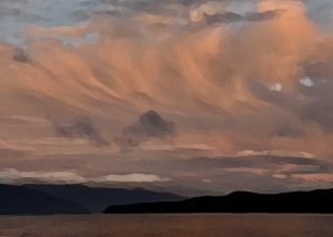 Alaska notecard showing cloud formation and colorful sky over mountains.