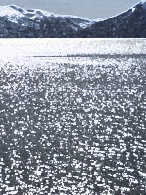 Shining water on a calm day at sea, mountains in the background. Icy Strait, Alaska.